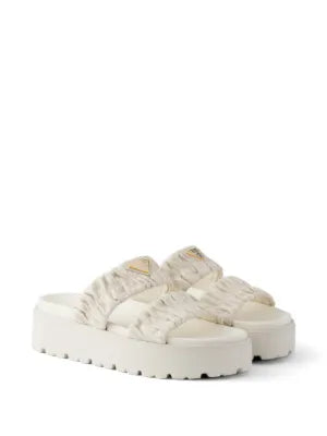 Prada Matelassé nappa leather flatform slides