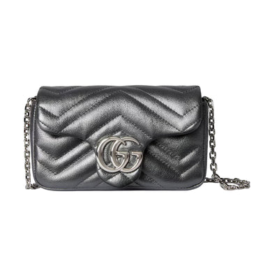 gucci Metallic silver handbag with a chain strap on a light gray background