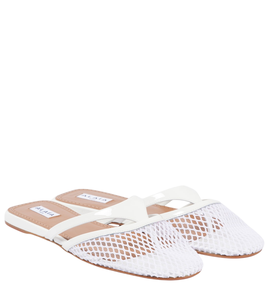 Alaïa Mules in pelle e rete Infradito