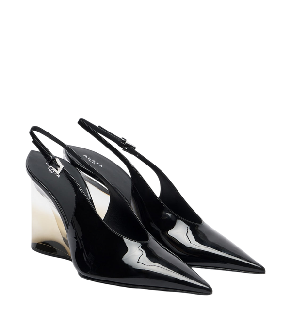 Alaïa Invisible patent leather wedge pumps