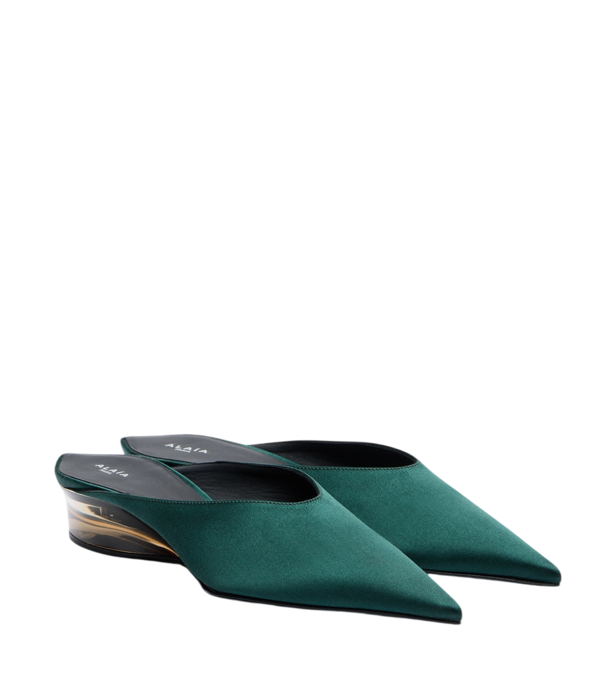Alaïa Mules con zeppa in raso invisibile