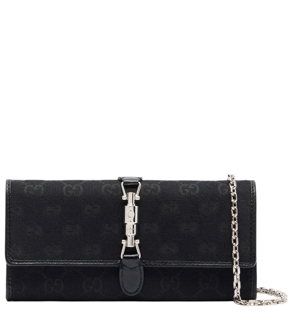 Clutch Gucci Jackie en lona GG