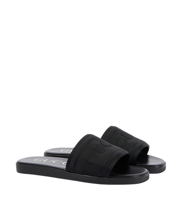 Gucci Sandali infradito in tela e pelle con logo