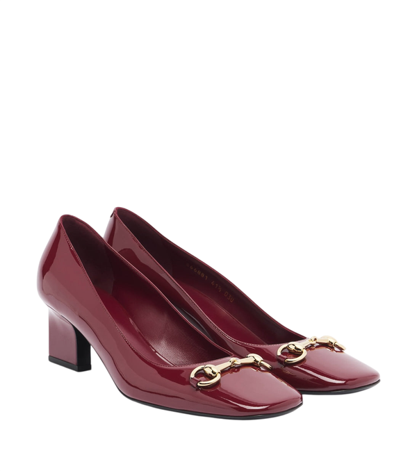 Salones Signora de piel charol con Horsebit de Gucci
