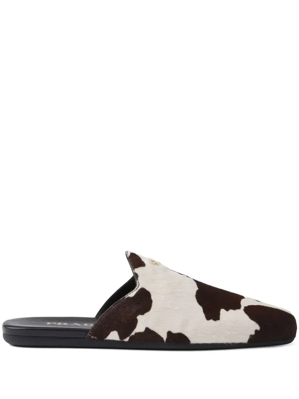 Prada cow-print slip-on mules