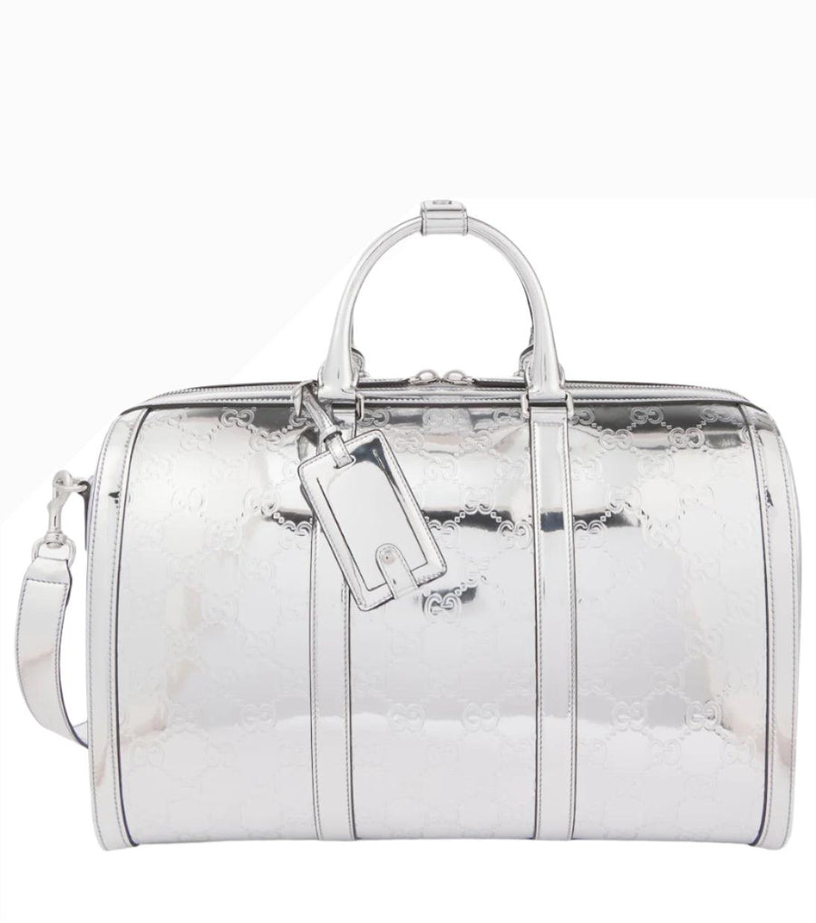 GUCCI GG Medium debossed duffel bag