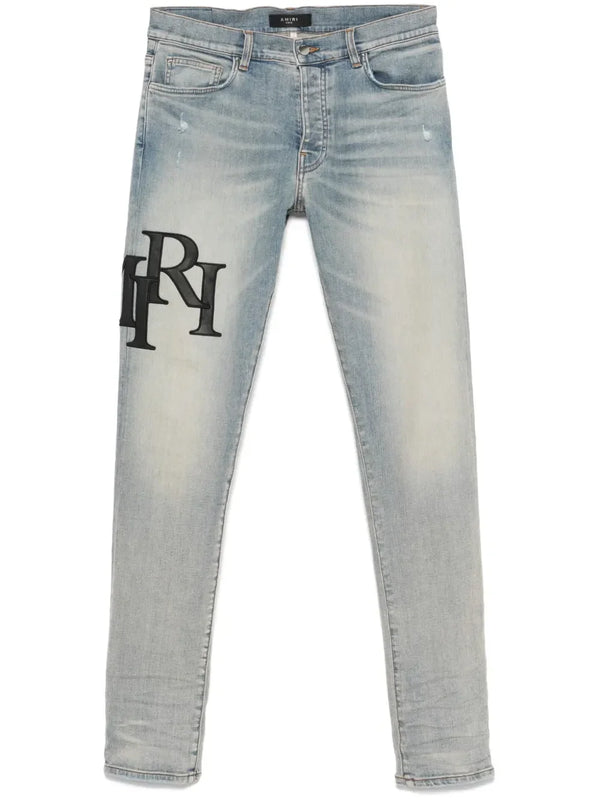 AMIRI Staggered-logo jeans