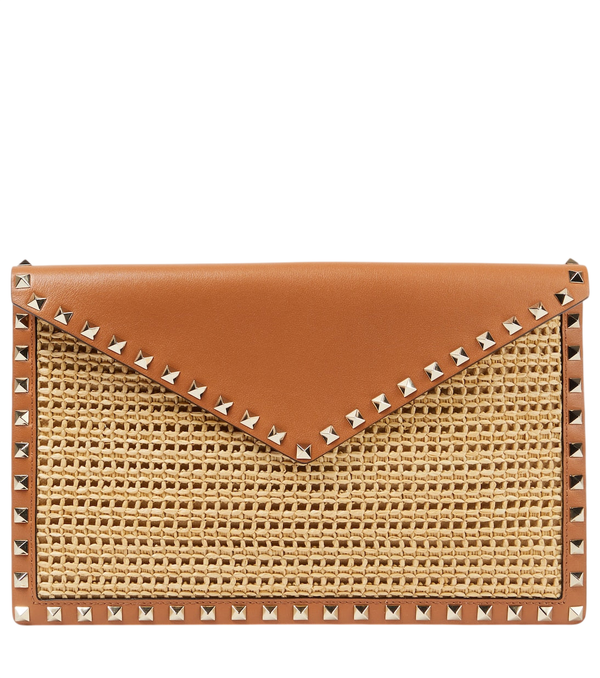 Valentino Garavani Rockstud Large leather-trimmed raffia clutch